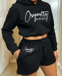 Designed for Fall this 100% cotton sweatsuit comes with a cropped hoodie and sweat shorts. High waist shorts and adjustable hem. Both pieces are finished with a raw hem and stitched with the OSOPRETTY! Be The True You logo in white. 100% Cotton  Machine wash cold, tumble dry low Fits fitted 